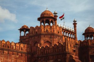 Stunning architectural view of the Red Fort with Indian flag, Delhi.
